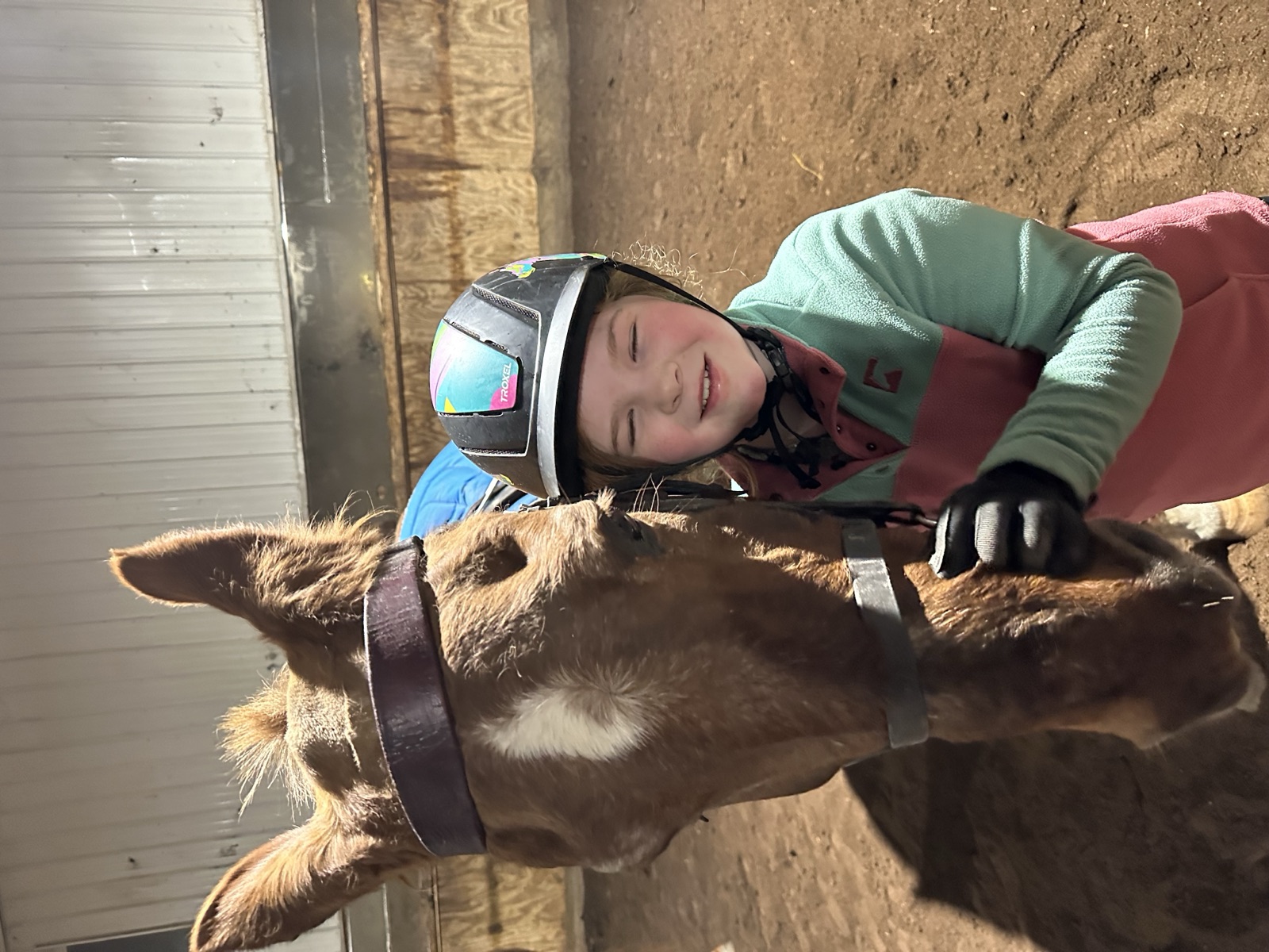 Evelyn smiling with her horse at LaFleur